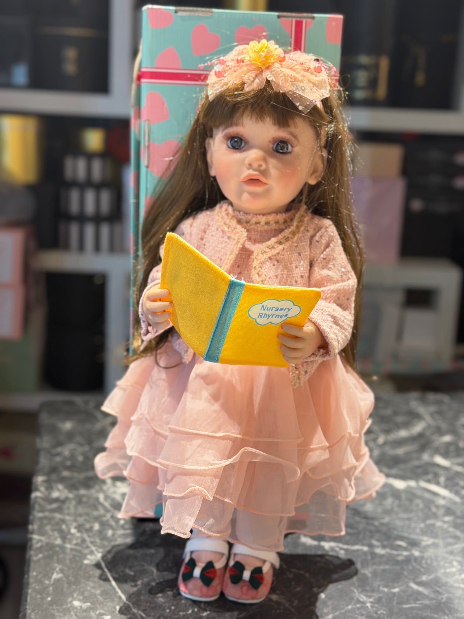 عروسة بائعة الورد الذكية (smart doll)