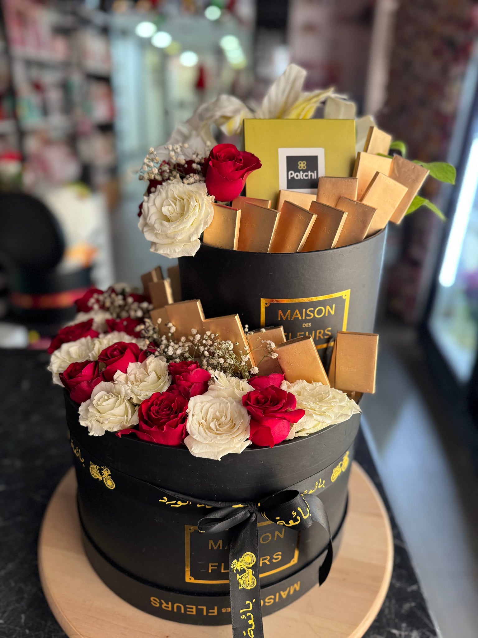 Tower Boxes Patchi & Flowers available black box - Bae3at Elward flower shop 