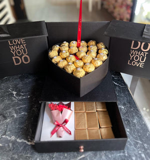 Boxs of roses, chocolate, balloons and pictures