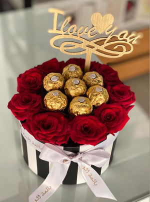 Round flower box with Ferrero Rocchio - Bae3at Elward flower shop 